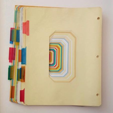 The Passion of Daedalus, an example of Broderick’s paper constructions made out of hand-cut reclaimed three-ring binder tab dividers